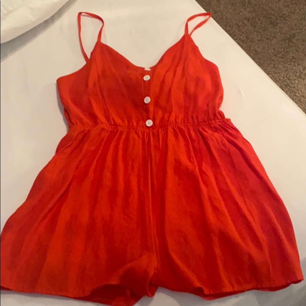 Red open back romper L